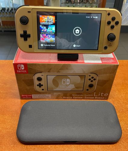 Nintendo Switch Lite Hyrule Edition + Flip tok